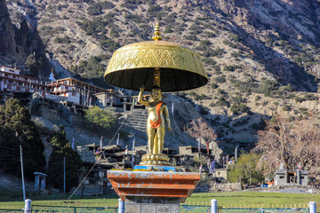 Golden statue in the mountains of Nepal