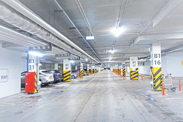 Fototapeta premium Parking garage - interior shot of multi-story car park