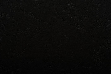 Black embossed abstract background.
