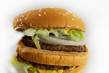 flat hamburger close up, in landscape format, on a white background