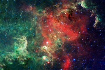 Obraz na płótnie Canvas Green cosmic nebula with bright areas and stars. Elements of this image were furnished by NASA.