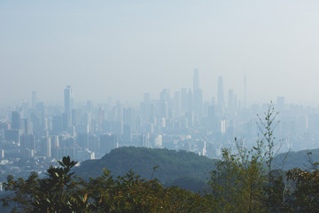 View of Guangzhou city with Zhujiang New Town from White Cloud Mountain, Baiyun Mountain, Guandong, China, sunny summer day