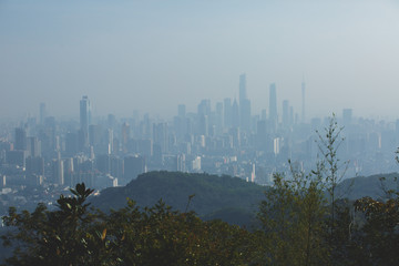 Fototapeta na wymiar View of Guangzhou city with Zhujiang New Town from White Cloud Mountain, Baiyun Mountain, Guandong, China, sunny summer day