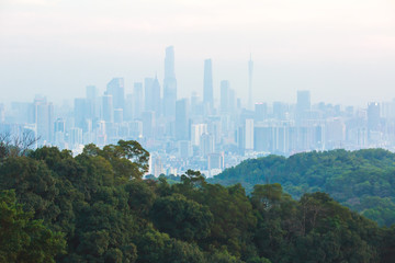 View of Guangzhou city with Zhujiang New Town from White Cloud Mountain, Baiyun Mountain, Guandong, China, sunny summer day