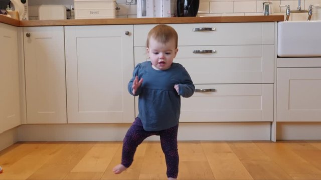 Baby girl / Toddler taking first few steps Walking but then falls over