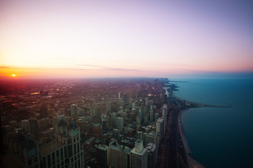 Obraz premium Chicago downtown panorama at sunset dusk with Concrete beach on Michigan and interstate 41 highway