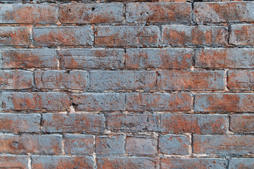Naklejka premium Very old brick wall with chipped paint. XXXL with incredible texture.