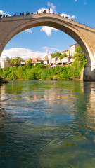 Mostar, Bosnia and Herzegovina, April 2019: Old bridge and Neretva River. 