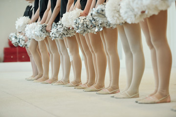Legs of cheerleading dancers