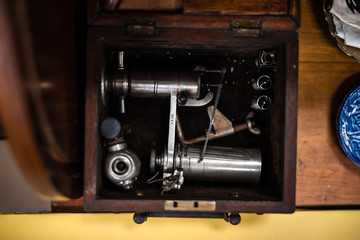 Dirty set of hand tools on a wooden panel vintage background with a tools old vintage house items sale garage storage container uk manchester london space for text advertisement