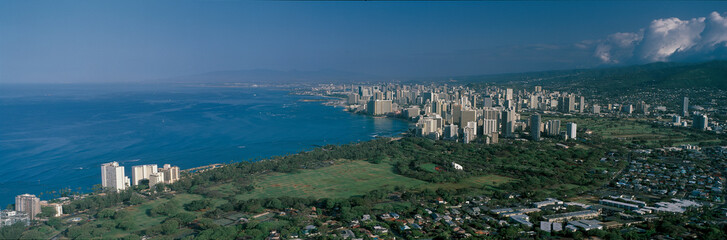 This is Oahu Island in daylight. It is the view from Diamond Head Volcano.