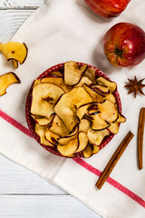 Baked Cinnamon Red Apple Chips. Selective focus.