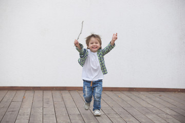 Happy boy runs around the stage. Blurred image - 316641366