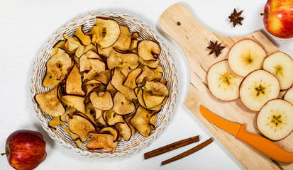 Baked Cinnamon Red Apple Chips. Selective focus.