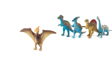 Toy dinosaurs isolated on white background.Copy space