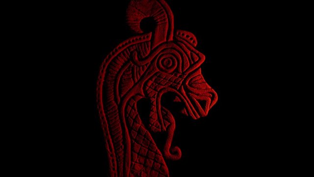 Viking Dragon Carving Lit Up On Black