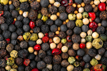 Closeup of mixed pepper background. Top view.