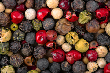 Closeup of mixed pepper background. Top view.