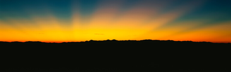 These are God Rays at sunrise over the Great Smoky Mountains.