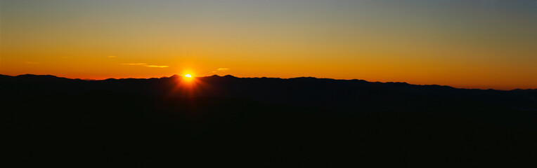 These are God rays at sunrise over the Great Smoky Mountains.