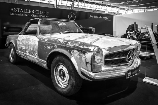 STUTTGART, GERMANY - MARCH 18, 2016: Prepared for the restoration of sports car Mercedes-Benz 230 SL Pagode (W113), 1968. Black and white. Europe's greatest classic car exhibition "RETRO CLASSICS"