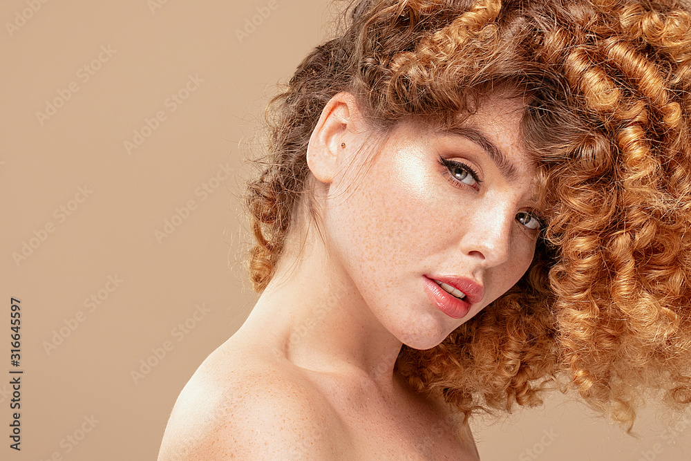 Wall mural redhair natural woman with freckles.