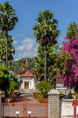 Street View of Wat Mai Suwannaphumaham or Wat Mai or Wat May is a Buddhist temple or Wat in Luang Prabang Laos. It is the largest and most richly decorated of the temples in Luang Prabang Laos