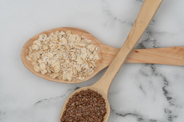 Seeds on a wooden spoon close up