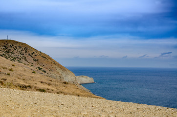 Sea and mountains. Seascape rocky coast. Travel and adventure.