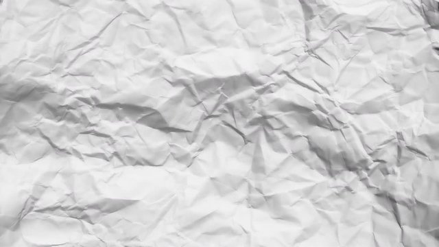 Crumpled White Paper Texture. Animated loop for backgrounds or overlaying as foreground filters to grunge up titles, motion graphics, or give footage a worn  or textured look with animated paper.