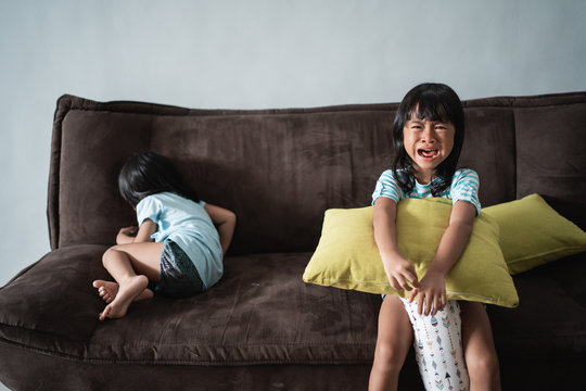 Upset Siblings, Kids Sister Ignoring Each Other After Fight. Children Crying Conflicts And Rivalry Concept