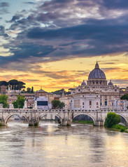 Fototapeta na wymiar A view along the Tiber River towards St. Peter's Basilica and the Vatican in Rome, Italy.