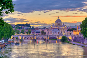 A view along the Tiber River towards St. Peter's Basilica and the Vatican in Rome, Italy.