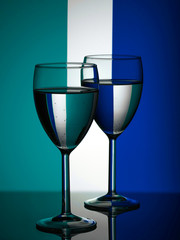 Wine glasses on striped background