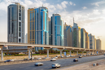 Obraz na płótnie Canvas Day traffic of Sheikh Zayed Road in Dubai, UAE