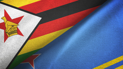 Zimbabwe and Aruba two flags textile cloth, fabric texture