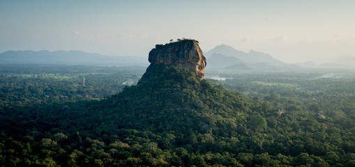 a sunset view of lion rock sigiriya from pidurangala looking across the sri lankan high country