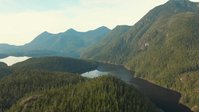 Beautiful Aerial Panoramic View of Larry Lake during a vibrant sunny day. Located on the West Coast of Vancouver Island near Tofino and Ucluelet, British Columbia, Canada.