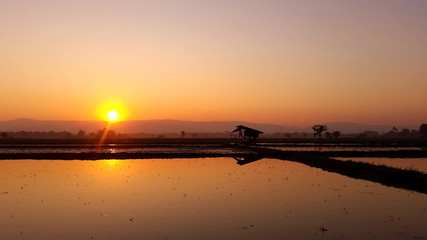 Reflection of sunrise, Landscape view in the morning at Chaing Rai Thailand.