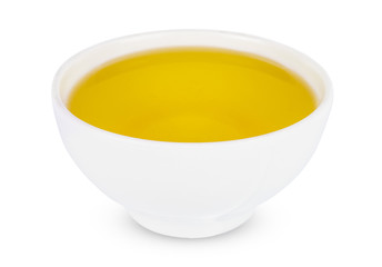 Sunflower oil in white bowl Isolated on a white background.