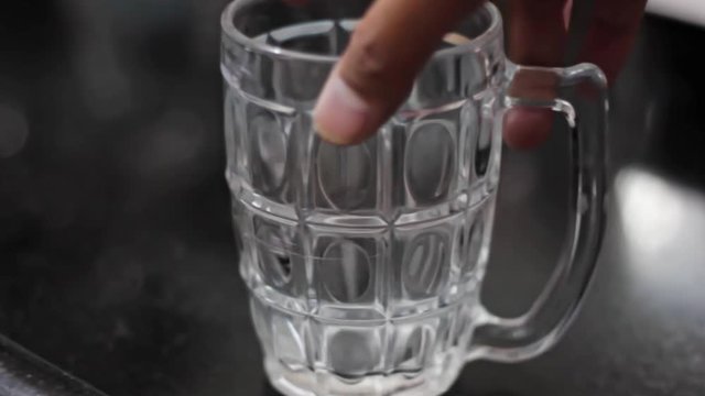 A Beer Mug replaced by a frosted mug close-up still shot.