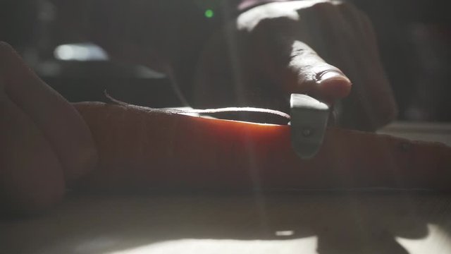 Peeling the skin off a carrot