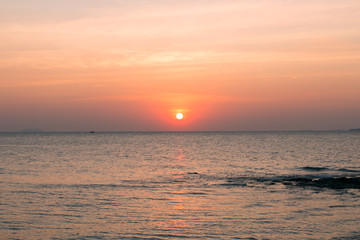 Sea pink sunset. Beautiful color clouds.