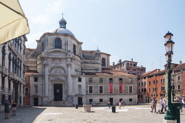 Fototapeta na wymiar VENICE, ITALY - JUNE 15, 2016 View to San Geremia church (Chiesa di San Geremia) on San Geremia square (campo San Geremia), located in the sestiere of Cannaregio, Venice, Italy
