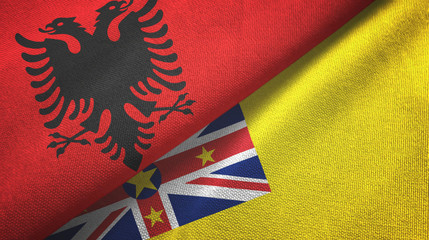 Albania and Niue two flags textile cloth, fabric texture