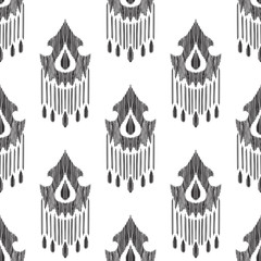 Ikat seamless pattern. Tribal background.