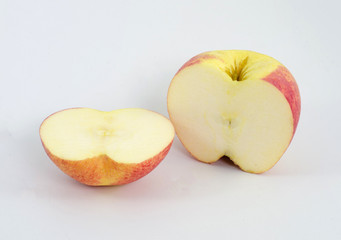 half of red apple isolated on white background