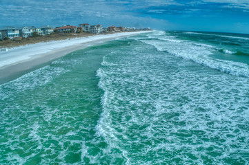 Fototapeta na wymiar Profile View of the Breaking Waves on a Windy Day at Santa Rosa Beach, Florida 