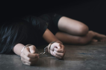 young girl hands handcuffed,trafficking concept,  human rights violations, missing kidnapped,