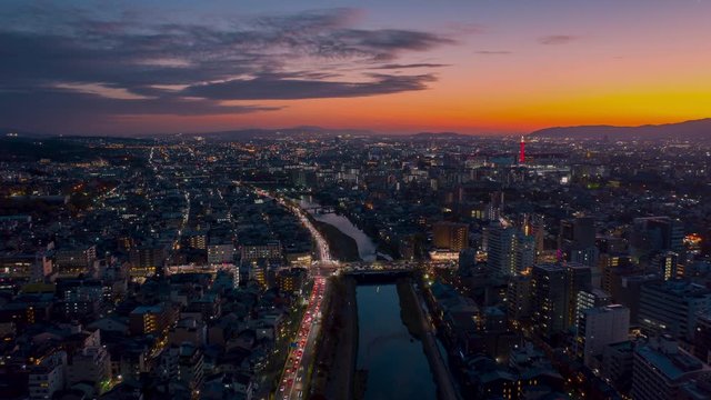 Aerial view Hyper lapse 4k Video of Building in Kyoto City on sunset at Kyoto, Japan.